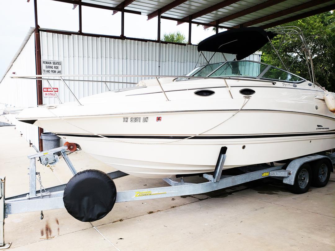 Storage space inside the white mini yacht cruiser boat rental at Lake Lewisville